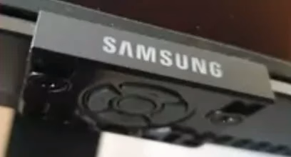 physical button in the middle of Samsung TV's front panel