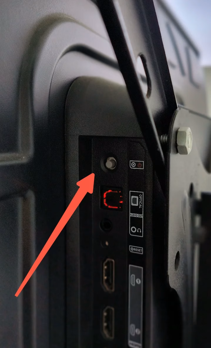 the small protruding power button on TCL Roku TV