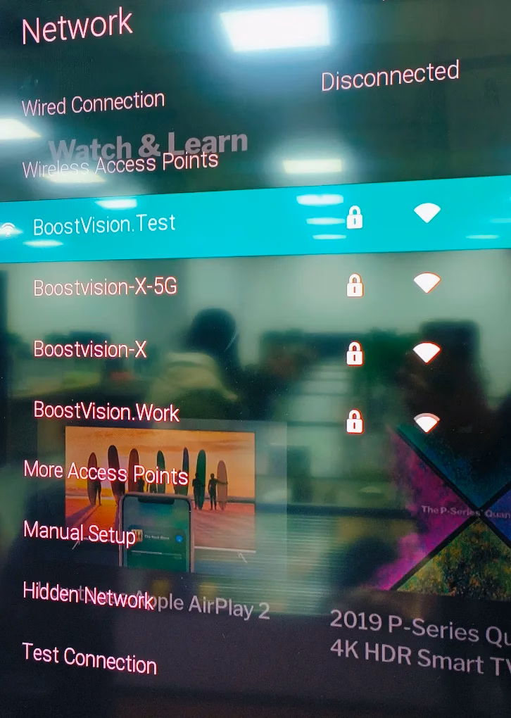 access the network connection menu on Vizio TV
